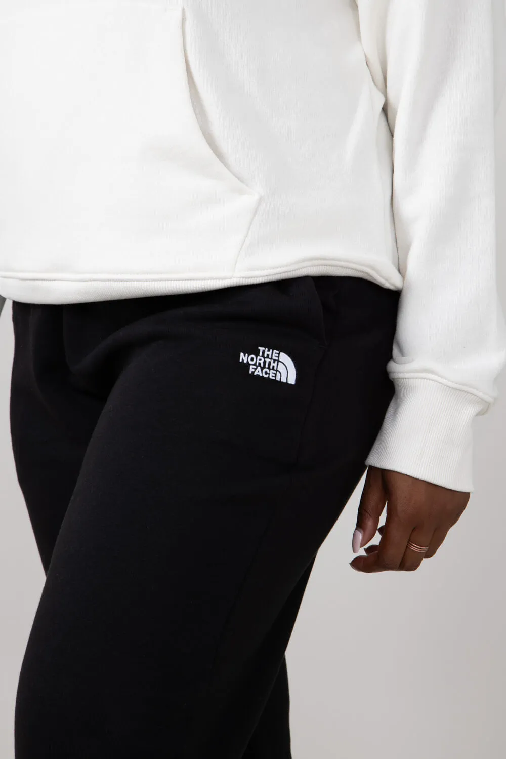 The North Face Core Joggers for Women in Black | NF0A890H-KY4
