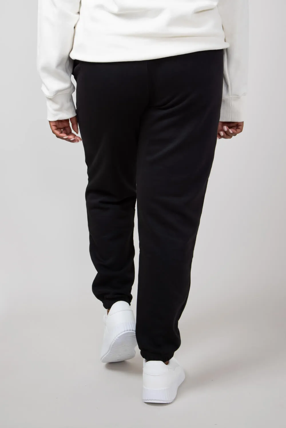 The North Face Core Joggers for Women in Black | NF0A890H-KY4